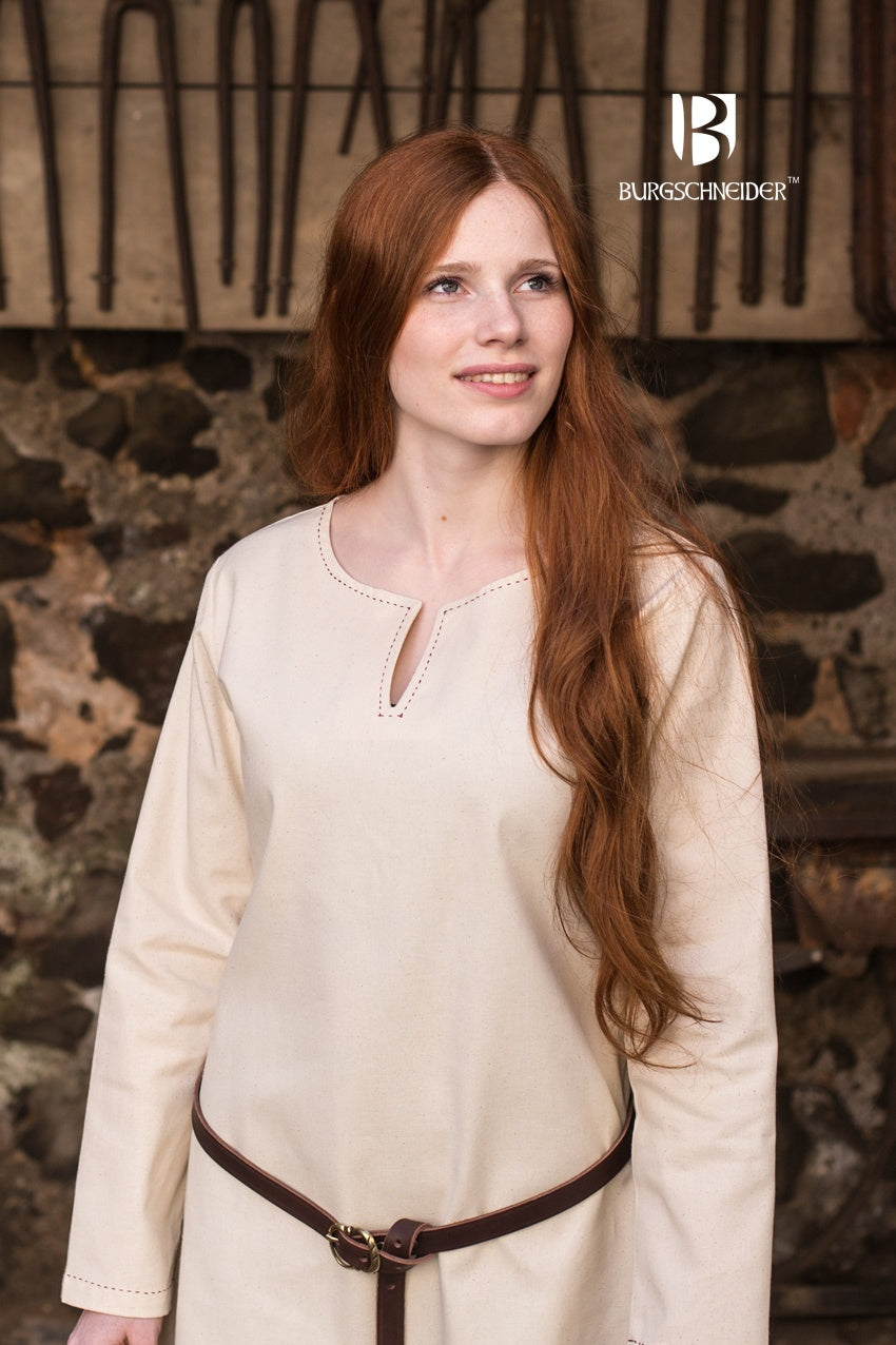 A medieval long-sleeved underdress in natural fabric, featuring decorative seams on the collar and sleeves, perfect for layering.
