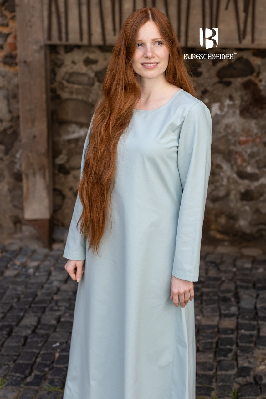 Under Dress Freya in Ice Blue, showcasing its sturdy cotton fabric and authentic design, perfect for summer wear.