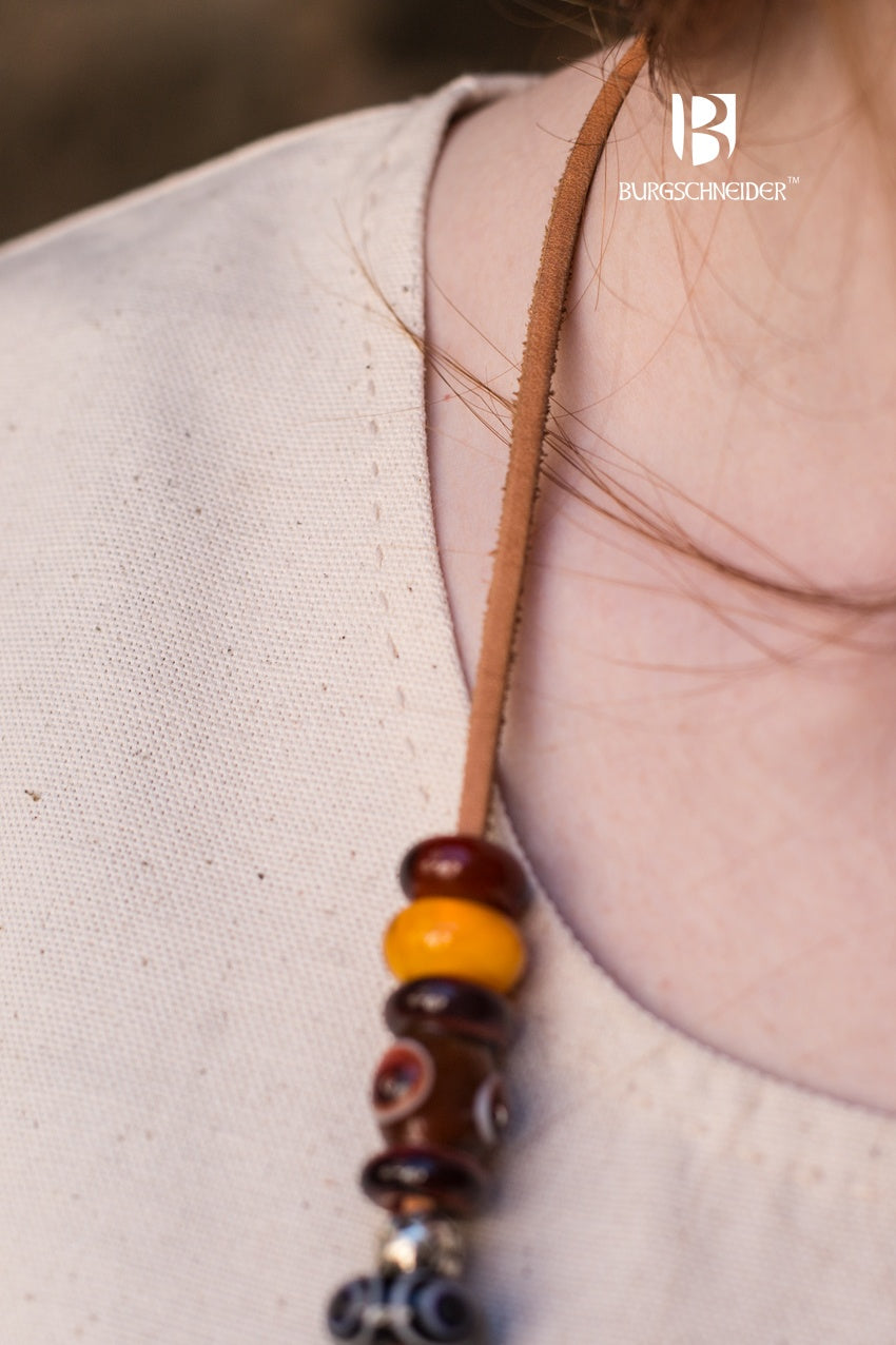 Under Dress Freya Natural, a women's undergarment made of sturdy cotton with a linen-like texture, showcasing its rustic charm and historical design.