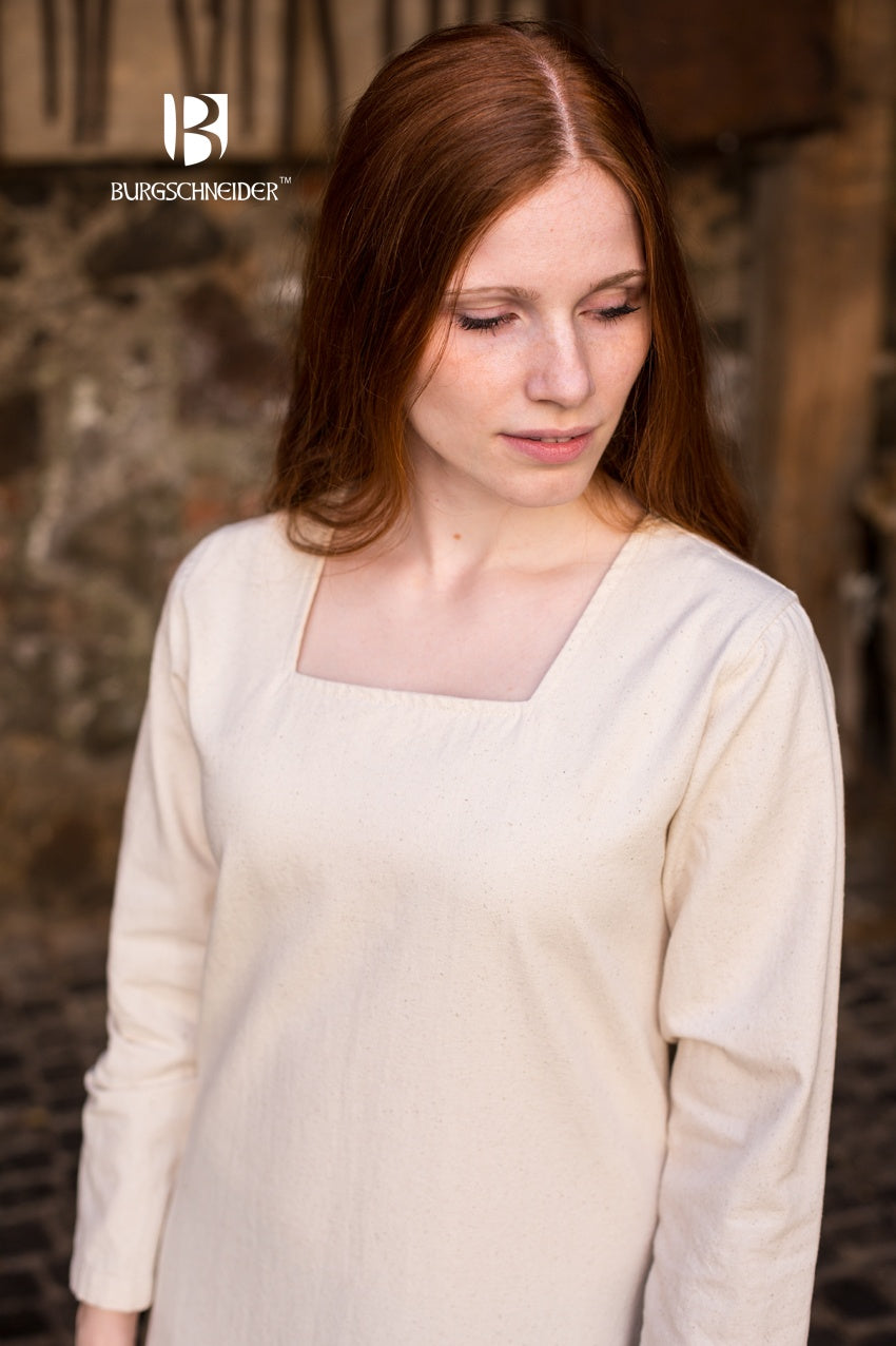 Under Dress Johanna Natural featuring a square neckline, long sleeves, and a robust cotton fabric with a linen look.