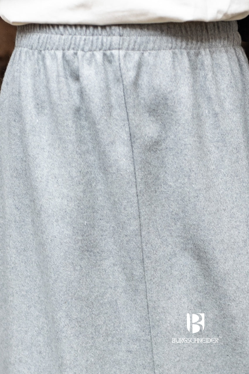 A warm grey wool felt underskirt with a soft elastic waistband, perfect for layering and versatile styling.