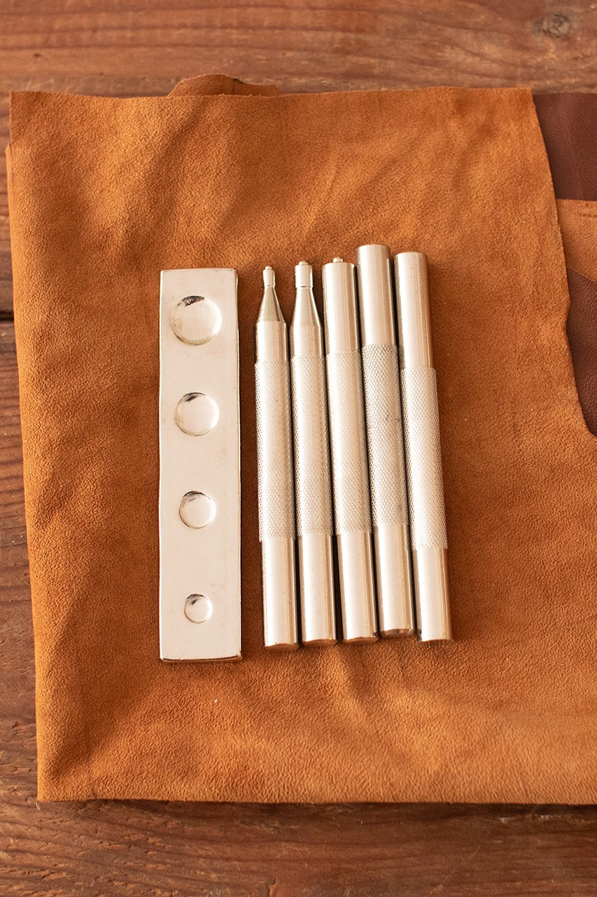 Universal Hand Rivet Setter made of iron with six punchers, designed for various rivet sizes up to 13 mm.