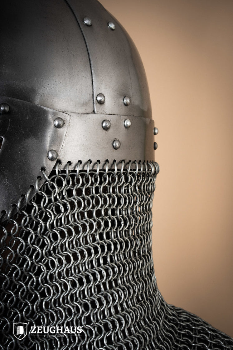 Viking helmet with aventail featuring a polished finish, adjustable leather lining, and chainmail neck protection, ideal for reenactments.