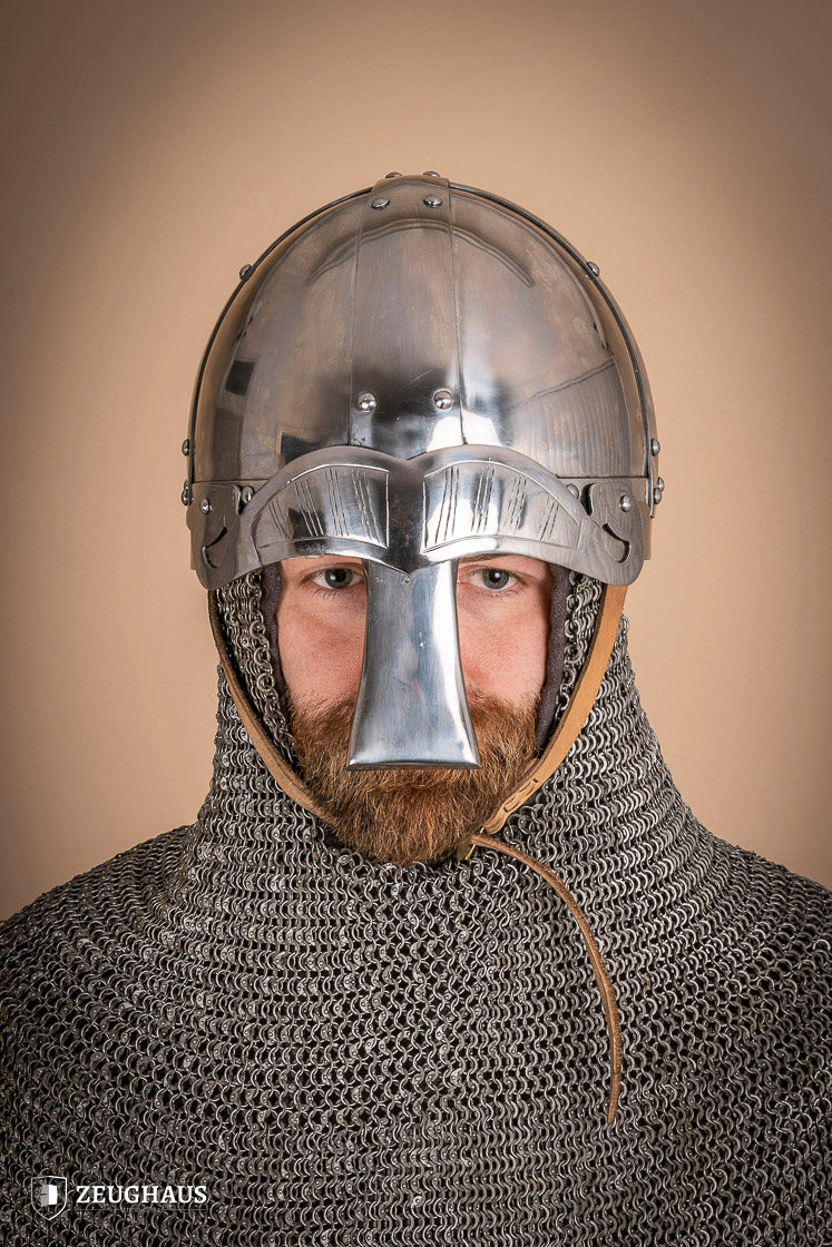Viking Spangenhelm 2mm polished helmet with ornamental detailing and curved nose guard, ideal for reenactments.