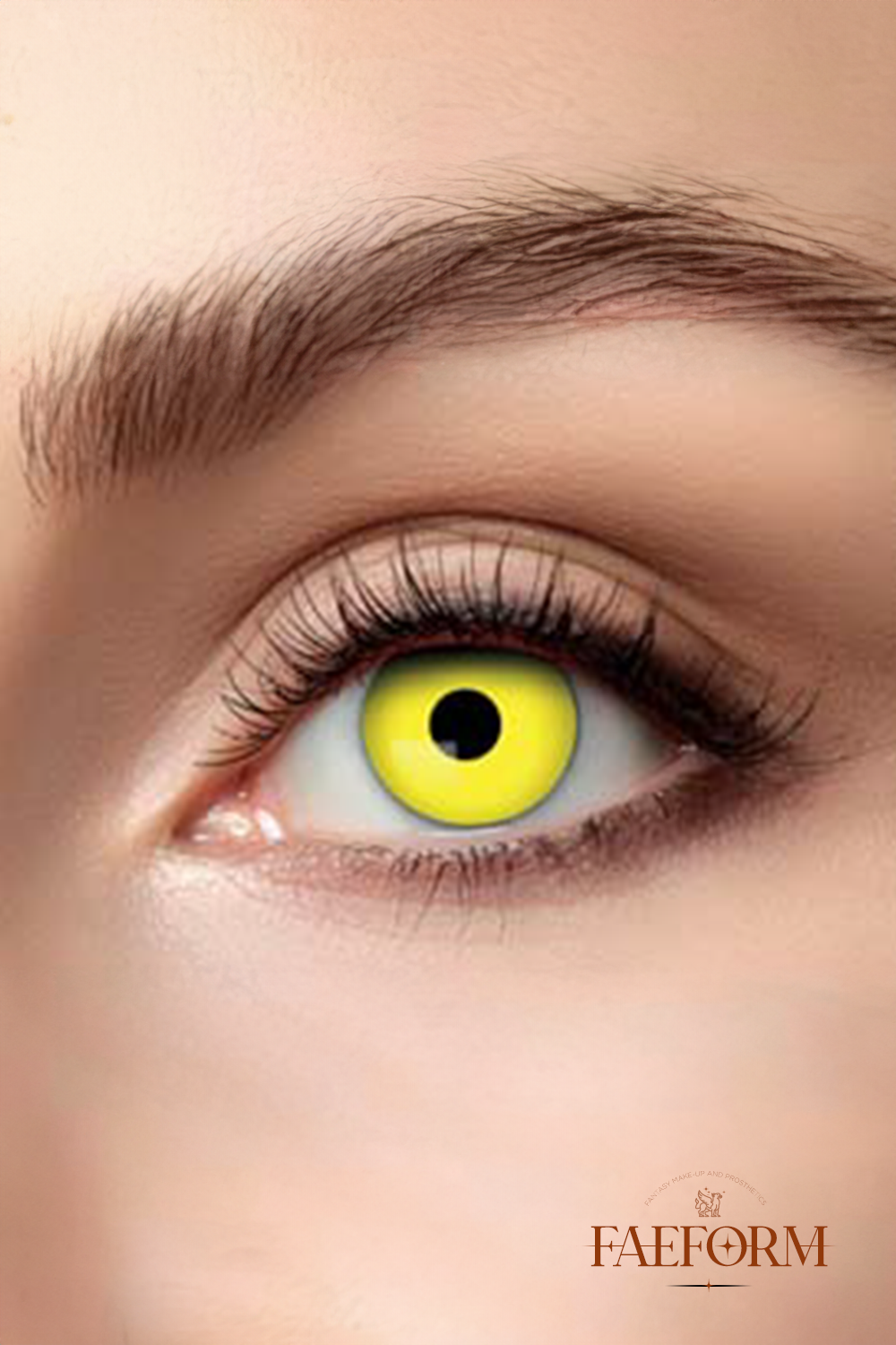 Vibrant yellow basilisk contact lenses in liquid, showcasing their striking color and design.