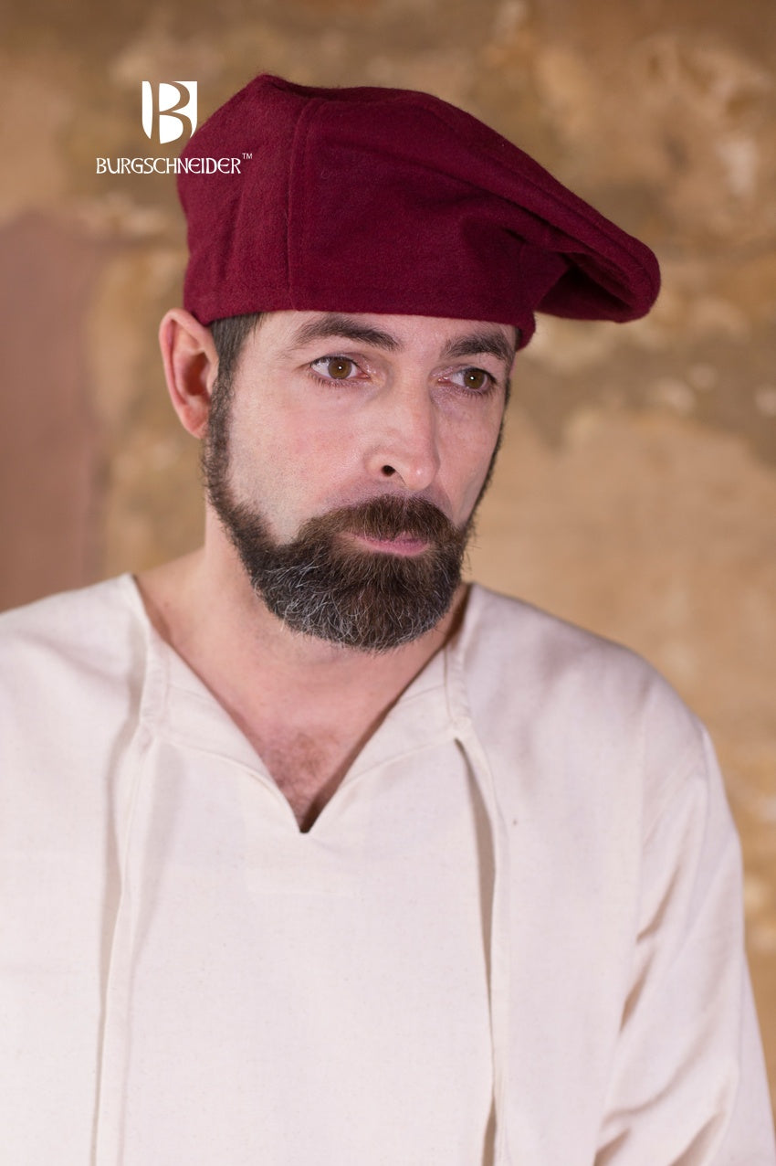 A vibrant red wool beret, showcasing a classic design, perfect for costumes and everyday wear.