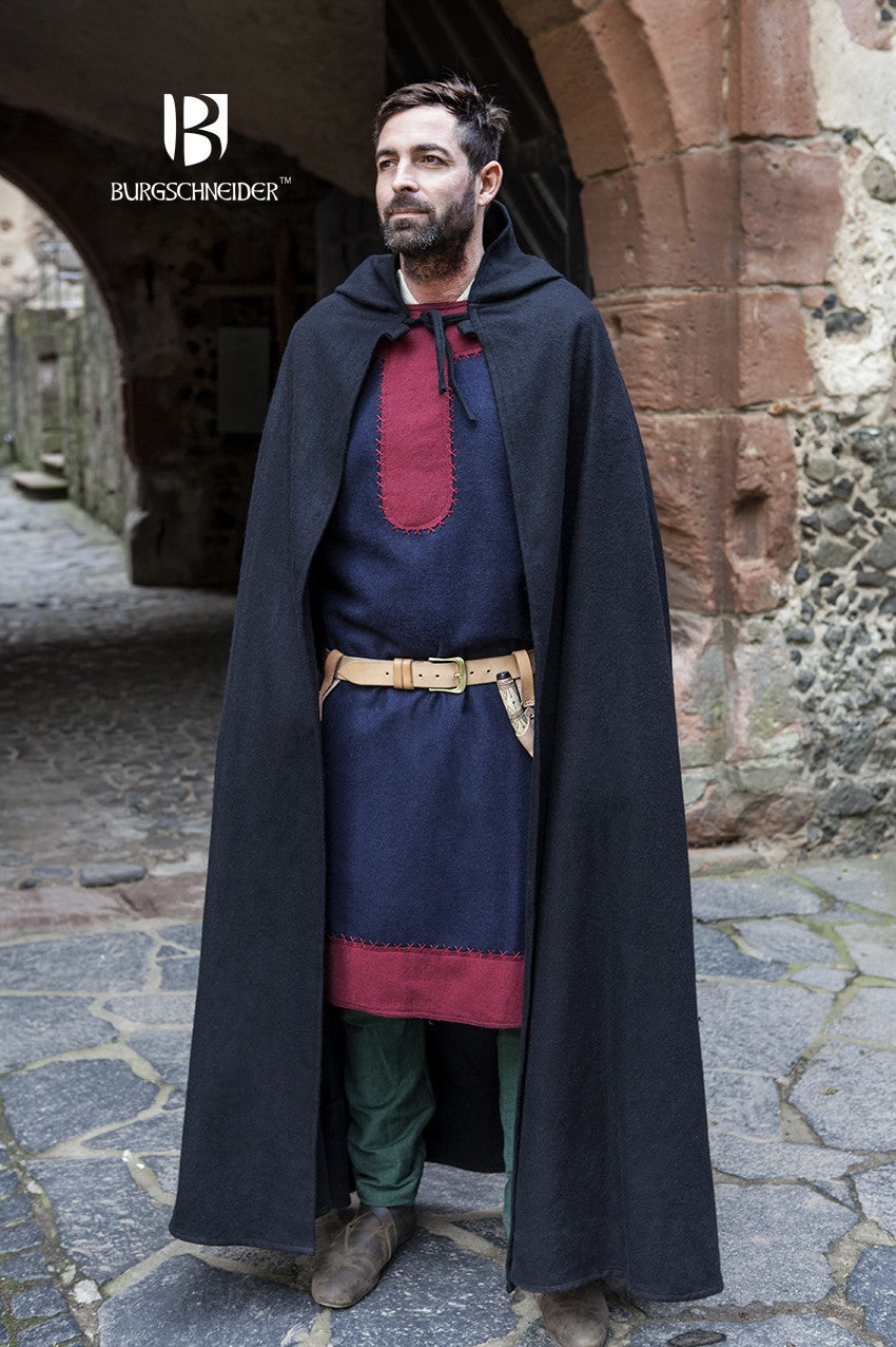 A stylish black wool hooded cloak with a pointed hood, featuring loops for brooch attachment and cloth ribbons for tying, perfect for medieval enthusiasts.
