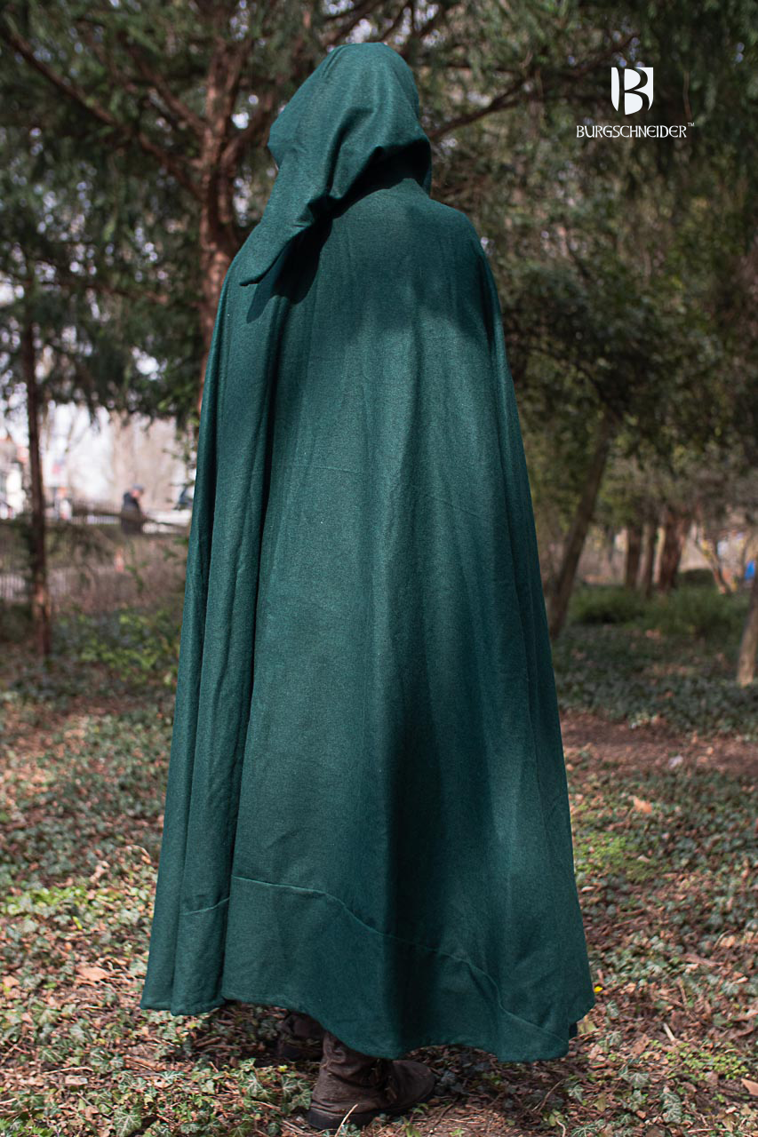 Wool Hooded Cloak Hibernus Green displayed on a mannequin, showcasing its pointed hood and heavy wool felt material.