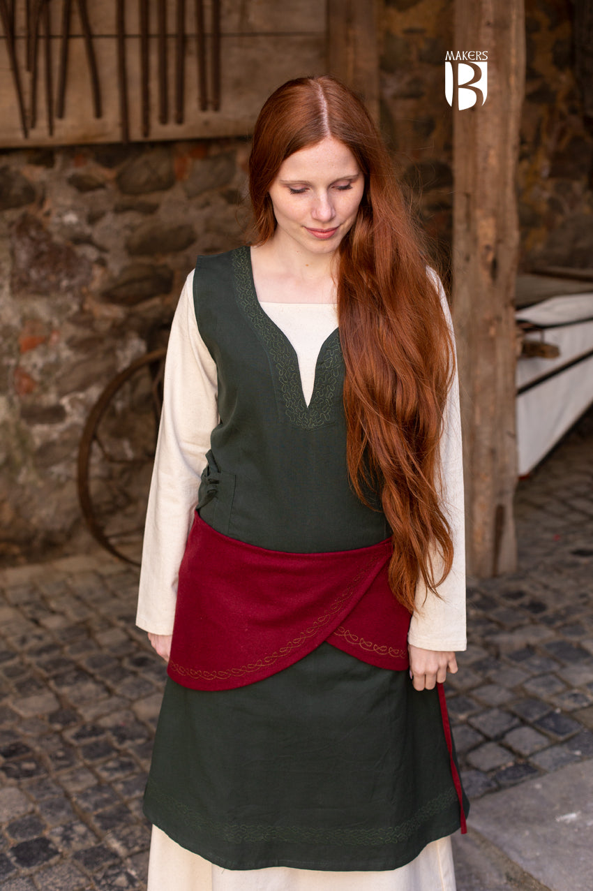 Wool Wrap Belt Ketra in vibrant red with ornamental embroidery, showcasing its stylish design and flexible lacing.