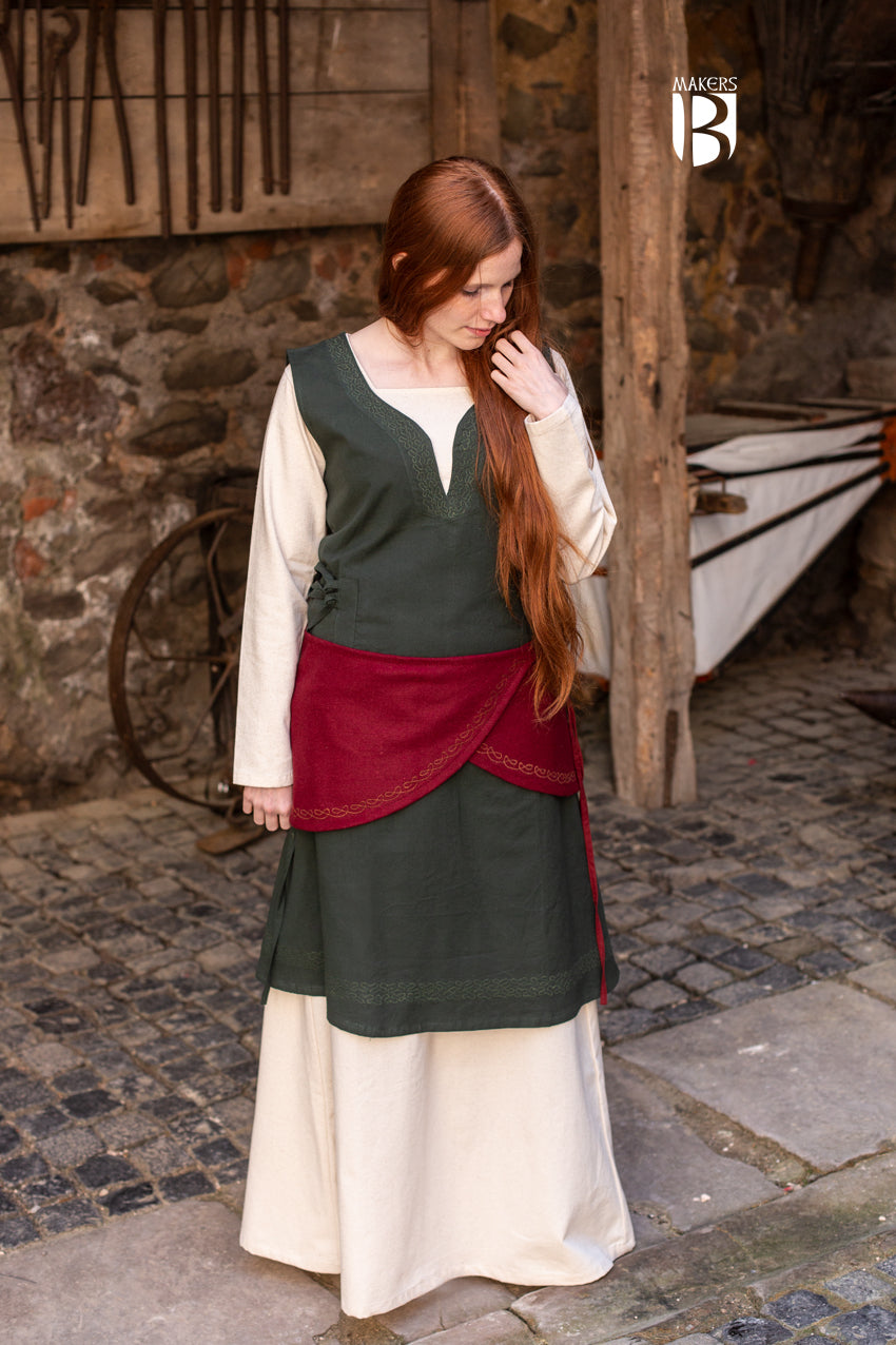 Wool Wrap Belt Ketra in vibrant red with ornamental embroidery, showcasing its stylish design and flexible lacing.