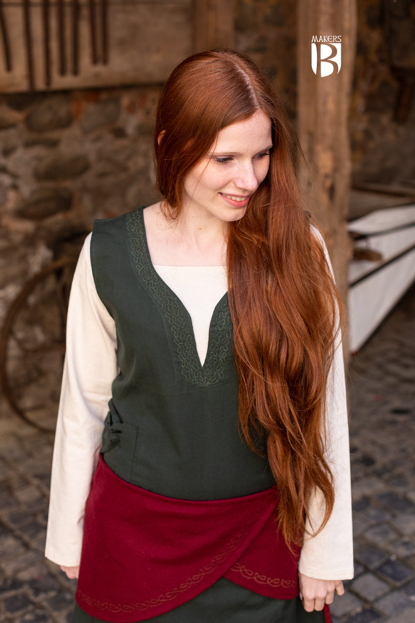 Wool Wrap Belt Ketra in vibrant red with ornamental embroidery, showcasing its stylish design and flexible lacing.