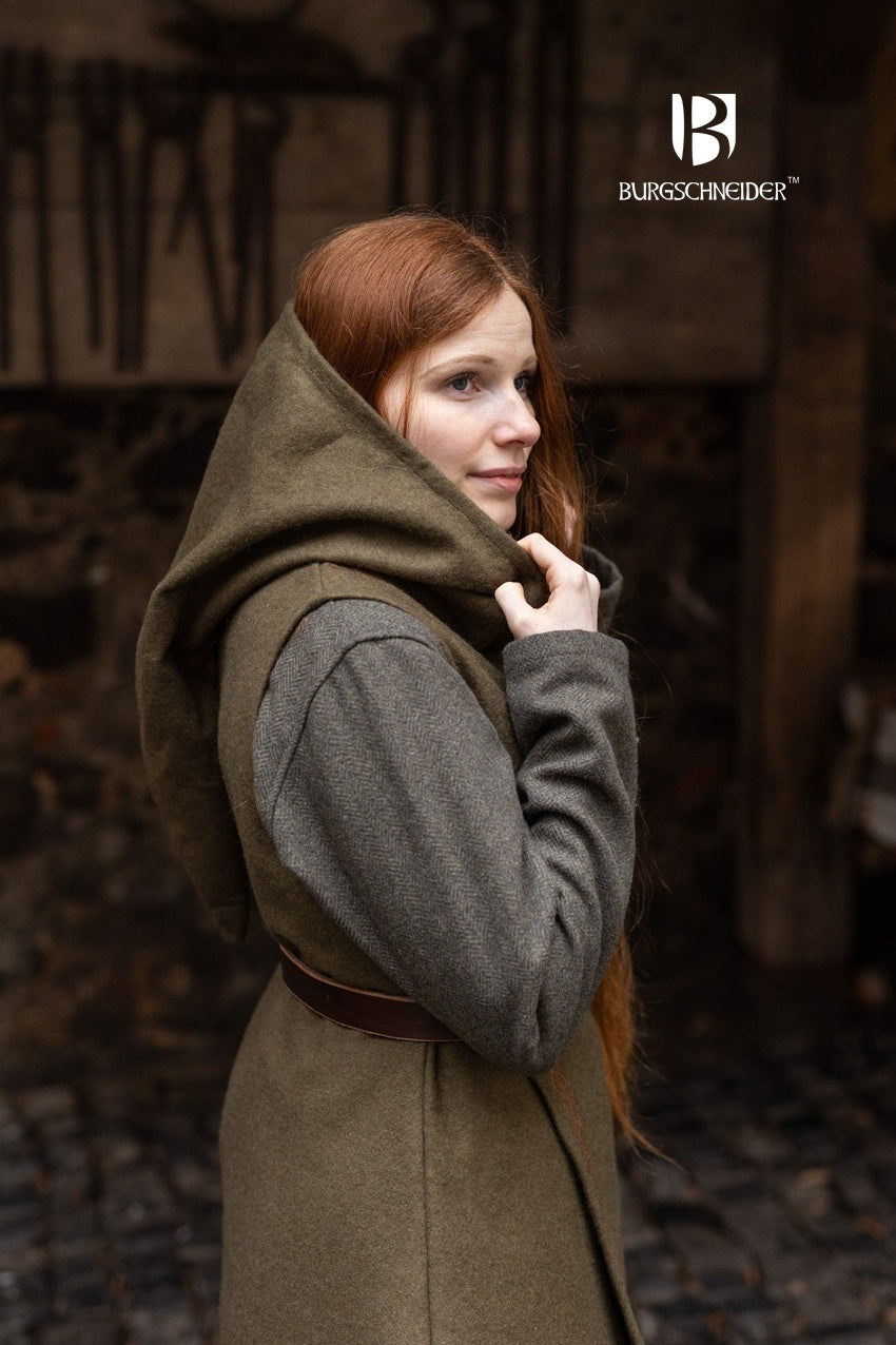 Wrap Dress Myrana in Autumn Green featuring a V-neckline, long hood, and ornamental embroidery, made from warm wool felt.