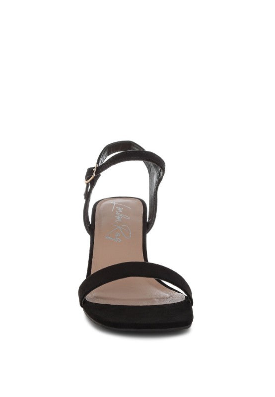 Akiya Square Toe Block Heels featuring a flared block heel, open square toe, and pin buckle fastening in recycled microfiber.