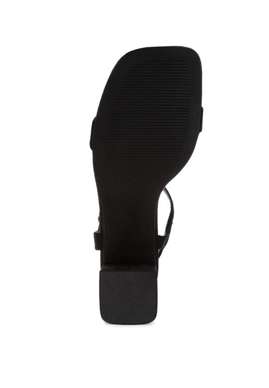 Akiya Square Toe Block Heels featuring a flared block heel, open square toe, and pin buckle fastening in recycled microfiber.