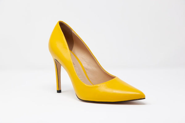 Kendi Pointed-Toe Leather Pumps showcasing a sleek design with a 3.4-inch covered heel, crafted from high-quality leather.