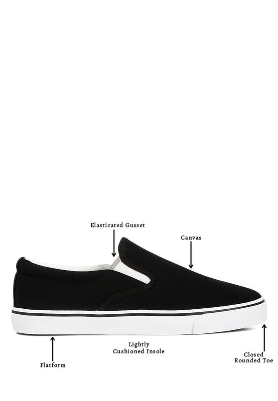 Merlin Canvas Slip On Sneakers in classic white, featuring elastic gussets and a padded collar for comfort.
