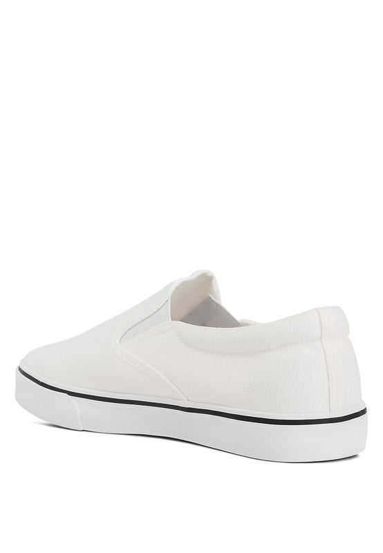 Merlin Canvas Slip On Sneakers in classic white, featuring elastic gussets and a padded collar for comfort.