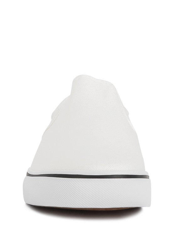 Merlin Canvas Slip On Sneakers in classic white, featuring elastic gussets and a padded collar for comfort.