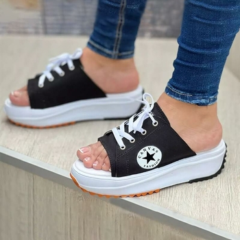 A pair of 2022 Casual Canvas Thick-soled Lace-up Women's Sandals in a stylish design, showcasing their thick sole and lace-up feature.