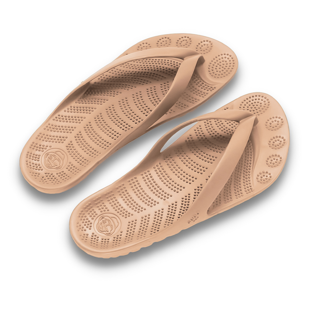 A pair of stylish Beach Nude Flip-Flops showcasing a minimalist design, perfect for beach and casual wear.