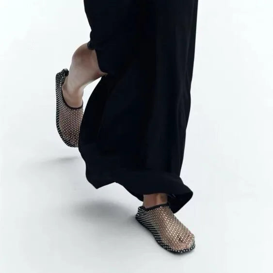 Luxury round toe flat bottom sandals with breathable mesh upper and durable rubber sole, perfect for summer casual wear.