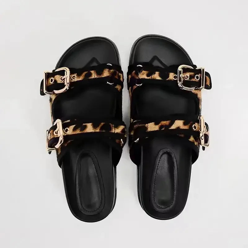 Stylish Women's designer Chic Flat Sandals featuring animal print and slip-on design, perfect for casual summer outings.