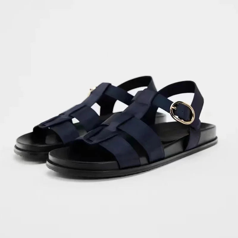 Stylish Women's designer Chic Flat Sandals featuring animal print and slip-on design, perfect for casual summer outings.