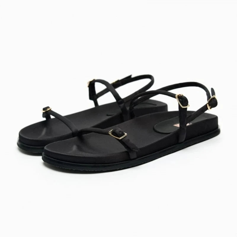 Stylish Women's designer Chic Flat Sandals featuring animal print and slip-on design, perfect for casual summer outings.