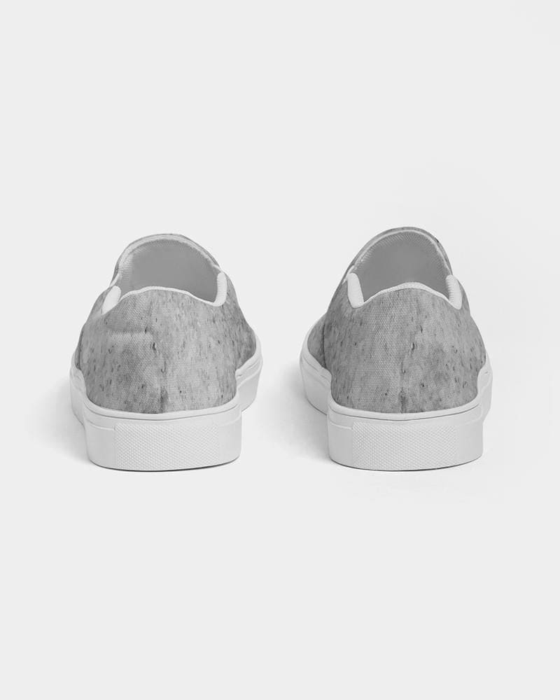 Men's grey low top slip-on canvas sports shoes with elastic side accents and padded collar, perfect for casual wear.