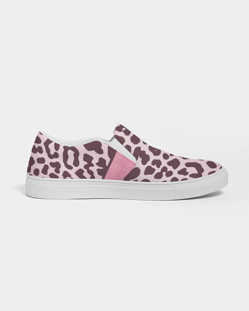 Women's slip-on canvas shoe featuring a vibrant pink leopard print design, perfect for stylish comfort.
