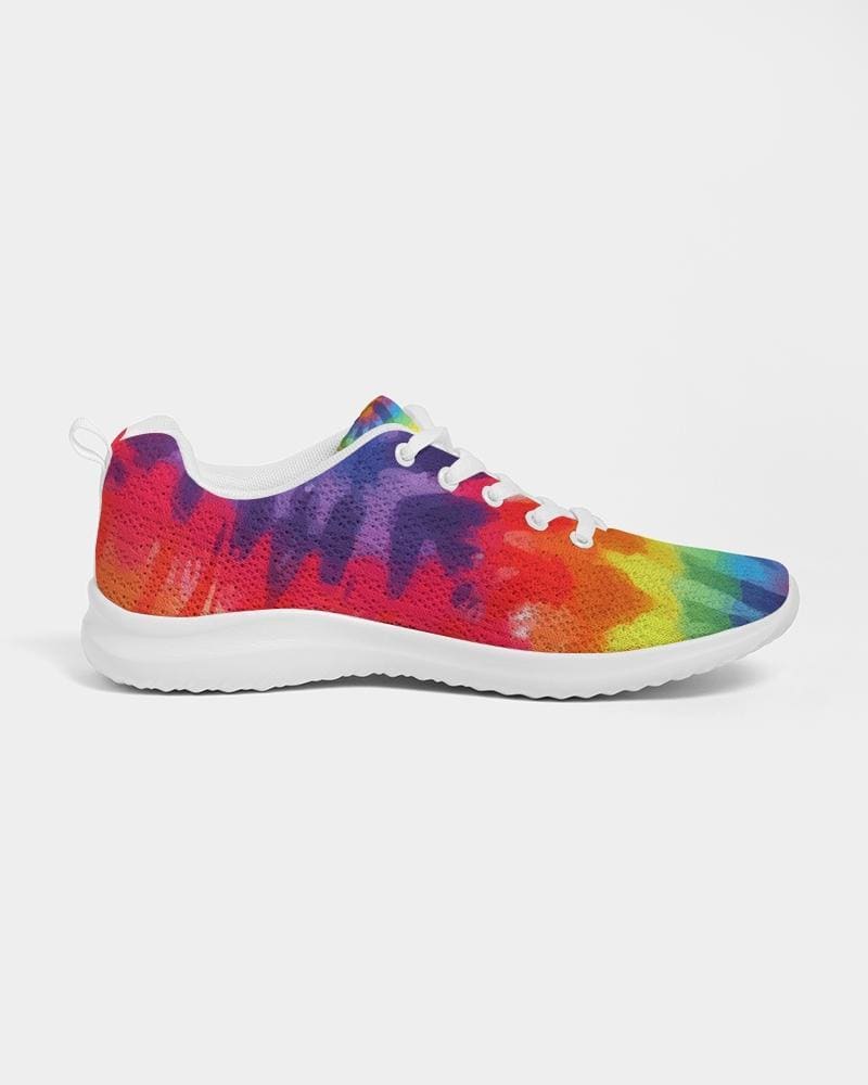 A pair of women's canvas running shoes featuring a vibrant multicolor tie-dye print, designed for comfort and style with a lace-up front and padded collar.