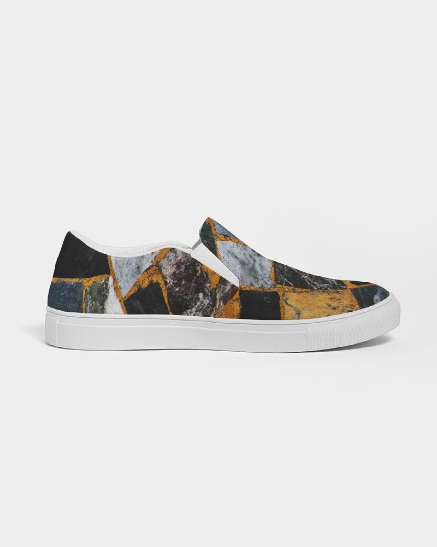 Womens Canvas Slip On Sneakers in Black Mosaic Print, showcasing a stylish design with elastic side accents and a padded collar.
