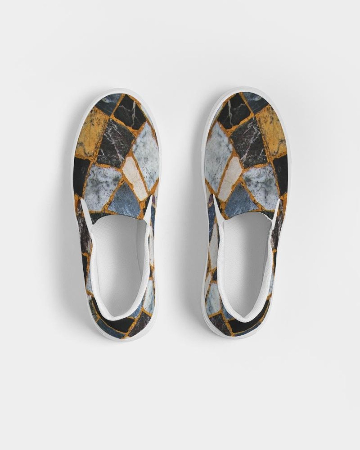 Womens Canvas Slip On Sneakers in Black Mosaic Print, showcasing a stylish design with elastic side accents and a padded collar.