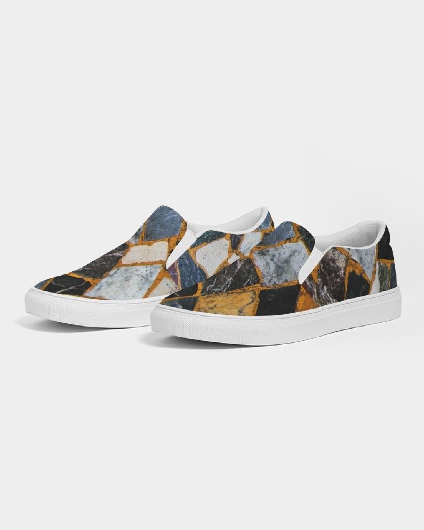 Womens Canvas Slip On Sneakers in Black Mosaic Print, showcasing a stylish design with elastic side accents and a padded collar.