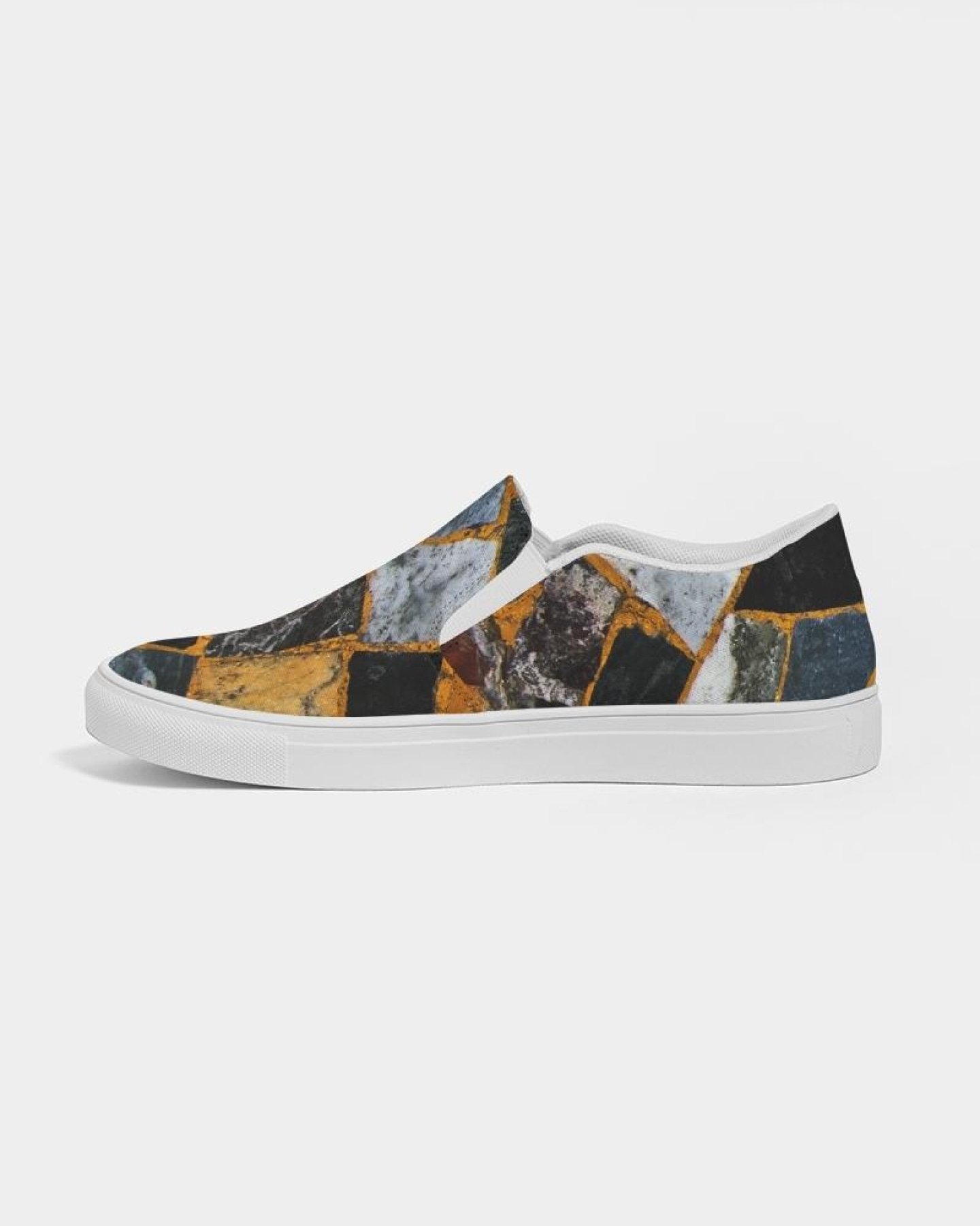 Womens Canvas Slip On Sneakers in Black Mosaic Print, showcasing a stylish design with elastic side accents and a padded collar.