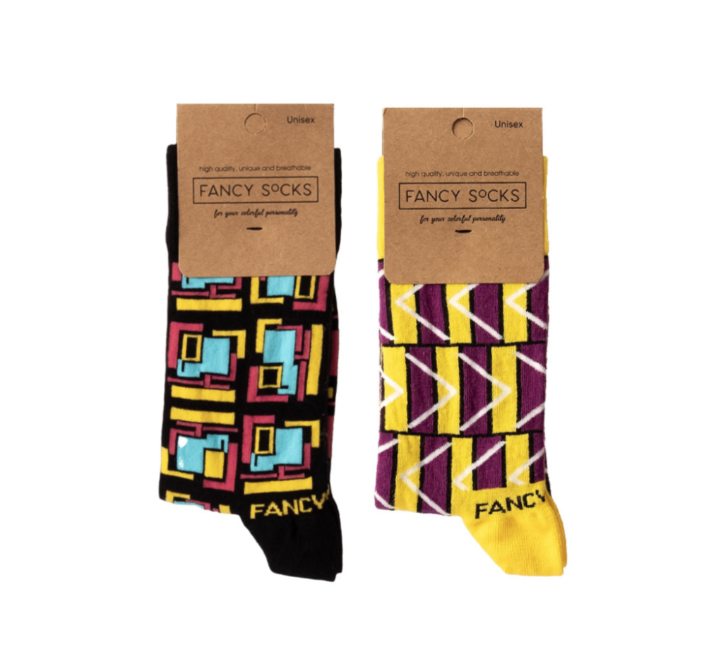 A pair of stylish black and purple geometric socks, showcasing a modern design perfect for any outfit.