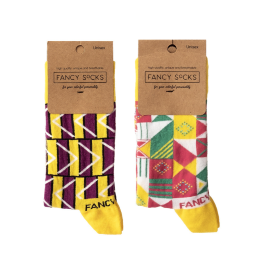 A pair of vibrant yellow and purple geometric socks, showcasing a stylish design perfect for any outfit.