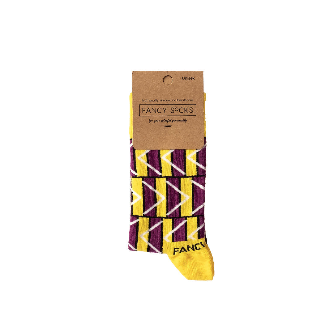 A pair of vibrant yellow and purple geometric socks, showcasing a stylish design perfect for any outfit.