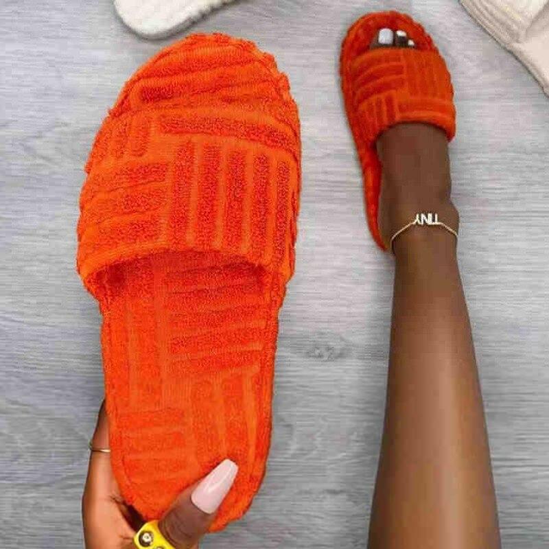 2021 Flat Furry Slippers with thick sole and open toe design for women, showcasing soft furry material and stylish appearance.