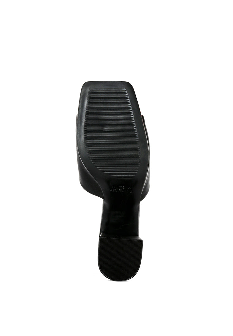 Artemisa Block Heel Slip On Sandals featuring a stylish block heel and open square toe design, perfect for casual and versatile wear.