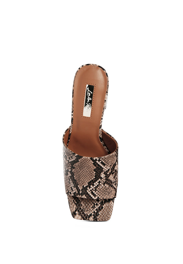 Artemisa Block Heel Slip On Sandals featuring a stylish block heel and open square toe design, perfect for casual and versatile wear.