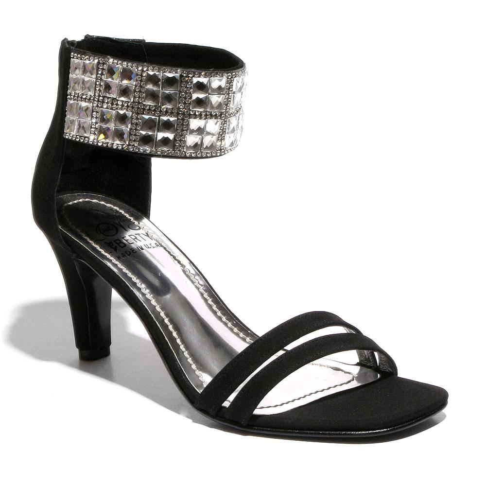 Attraction mid-height classy heel featuring a stiletto design, ankle cuff with gemstone accent, and double banded toe straps.