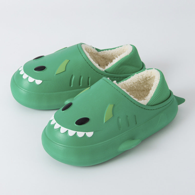 Cute women's waterproof shark cotton slippers in a cozy indoor setting, showcasing their playful design and soft material.
