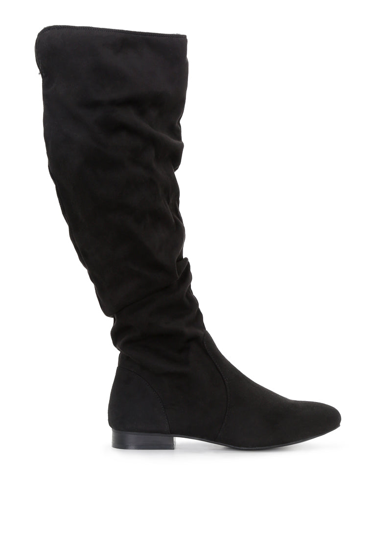 Becca Microfiber Knee High Boot showcasing stylish design with side zipper and low heel, perfect for winter wear.