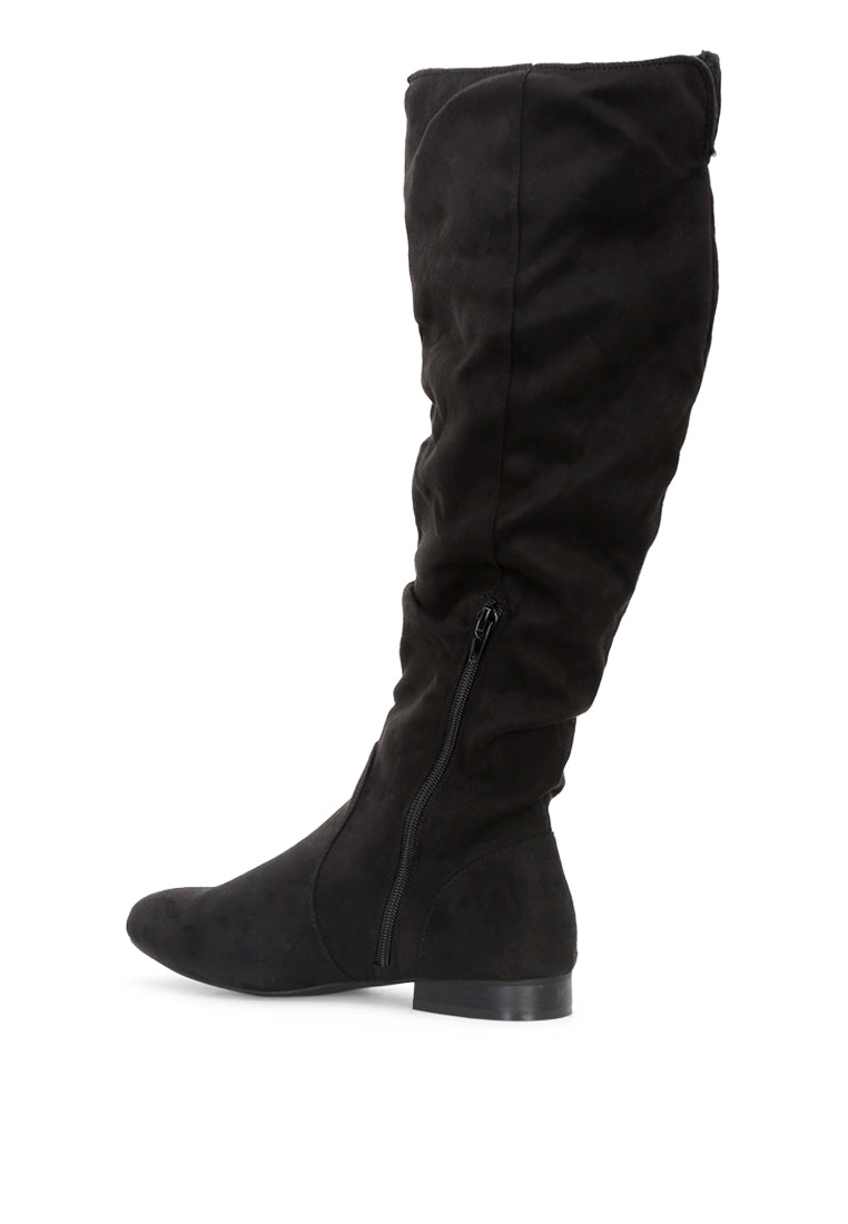 Becca Microfiber Knee High Boot showcasing stylish design with side zipper and low heel, perfect for winter wear.