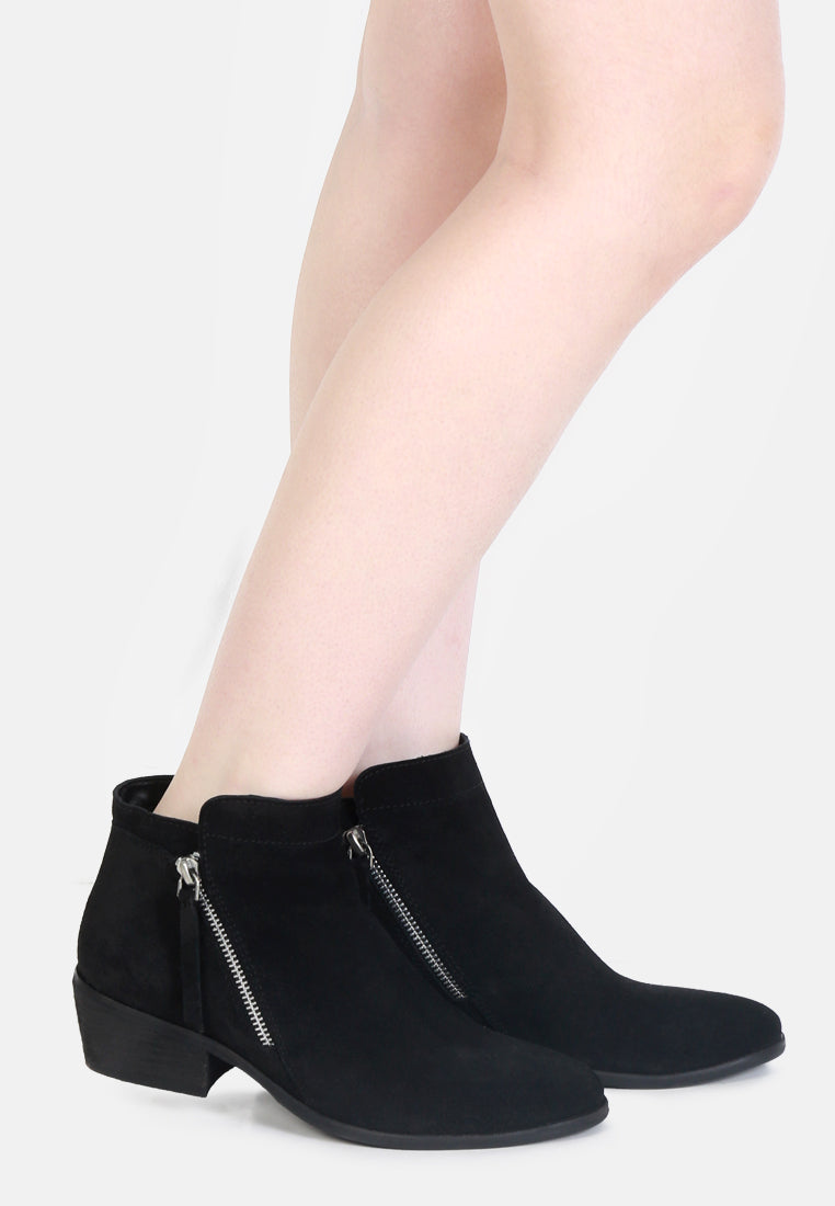 Bess Ankle Boots featuring a sleek design, zip closure, and stacked heel made from genuine leather.