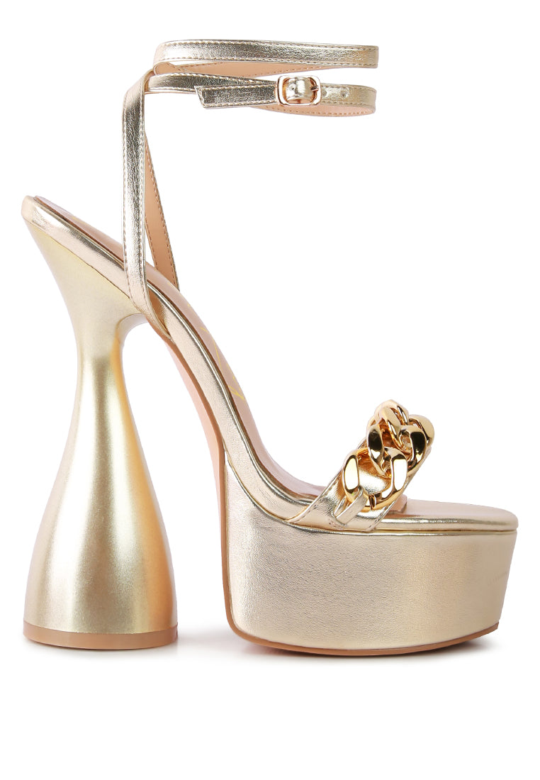 Big Bash Metallic High Platform Chunky Sandals featuring gold metallic faux leather, hourglass heel, and gold chain embellishment.