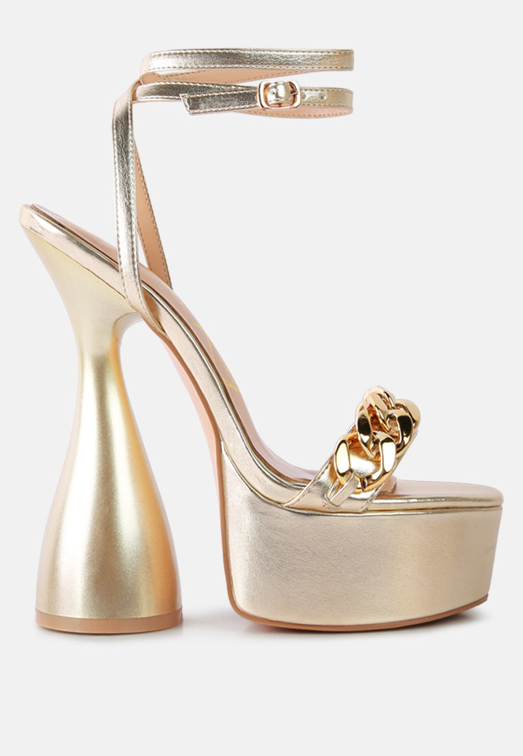 Big Bash Metallic High Platform Chunky Sandals featuring gold metallic faux leather, hourglass heel, and gold chain embellishment.
