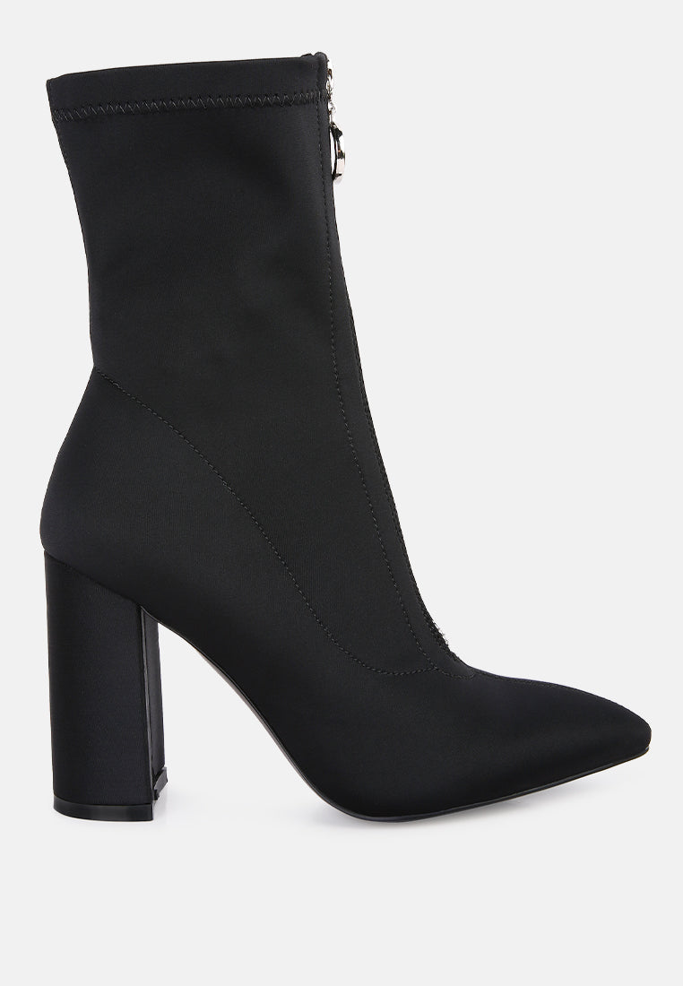Bobbettes Block Heeled Microfiber Ankle Boot featuring a metallic zipper and a stylish block heel, designed for comfort and elegance.