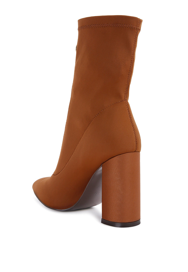 Bobbettes Block Heeled Microfiber Ankle Boot featuring a metallic zipper and a stylish block heel, designed for comfort and elegance.